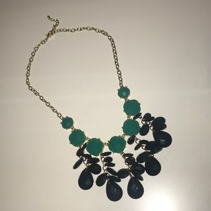 Blue jewel and gold chain necklace